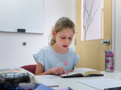 dyslexia-tutoring-case-study A dyslexic student reads during a 1-to-1 tutoring session at the Commonwealth Learning Center.
